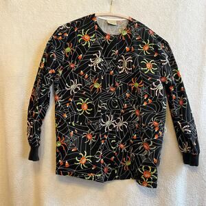 Tafford Halloween spider webs and candy corn. 100% cotton, comfortable, cute